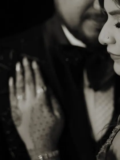 A timeless black and white portrait. This style emphasizes the emotion and connection, stripping away distractions to focus on the couple's bond.