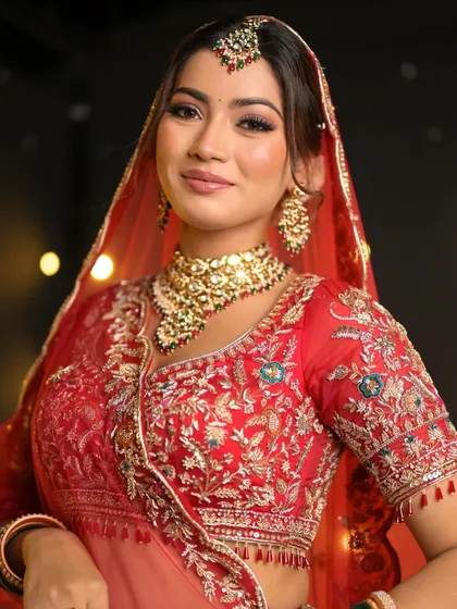 A smiling portrait that shows how the makeup enhances her natural beauty. The look is radiant and happy, perfect for a bride on her wedding day.
