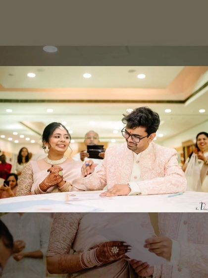The couple signing their marriage certificate, a significant and happy moment from their simple and beautiful wedding day.