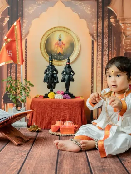 A seated 'Chota Varkari' playing with a string of beads. The detailed set includes idols of Vitthal Rukmini, a tulsi plant, and other devotional items.