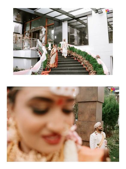 A creative composition capturing the bride and groom during their first look. The focus on the groom's expression from the bride's perspective adds a unique storytelling element.