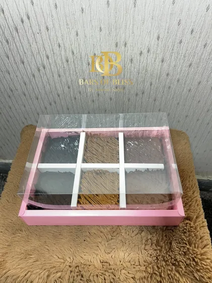 A look inside the six-piece Rakhi brownie box, showing the neat separation of the different brownie flavours.
