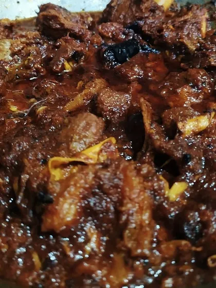 The magic of Kawsha Mangsho lies in the slow caramelization of the marinated meat. It takes a long time to cook, but the burst of flavors in your mouth makes it all worth it.