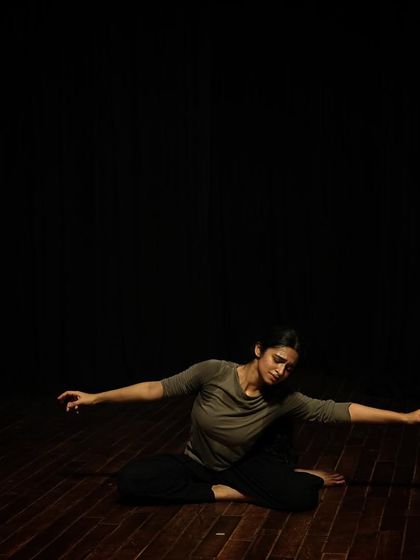 A dancer on the floor during a tech run.