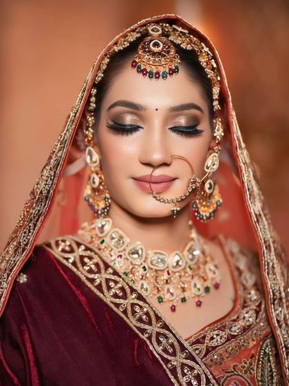 The classic closed-eye pose to showcase the beautiful eyeshadow blending and long, dramatic lashes.