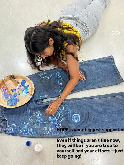 Here I am painting my old jeans on the floor of my studio. Hope is your biggest supporter. I believe that if you are true to yourself and your efforts, things will be fine.