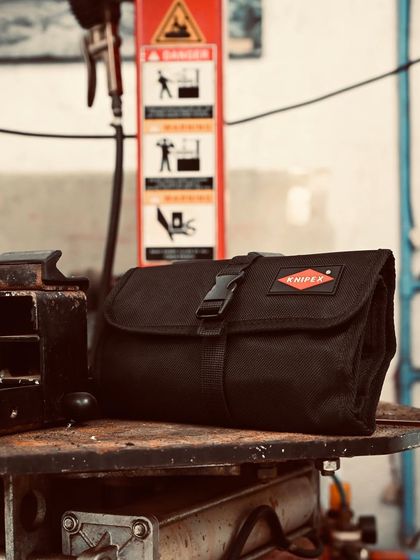 A Knipex tool roll, a must-have in every professional garage for its quality and durability.