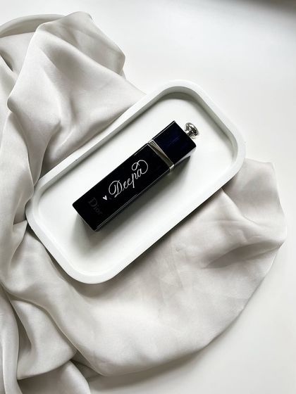 The 'Her' part of the gift set, a Dior Addict lipstick case engraved with a name. Paired together, they make a thoughtful and elegant couple's gift.