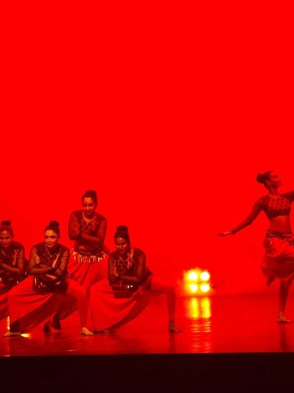 A dynamic moment from a group performance, showing the different layers and formations we use in our stage choreography to keep the audience engaged.