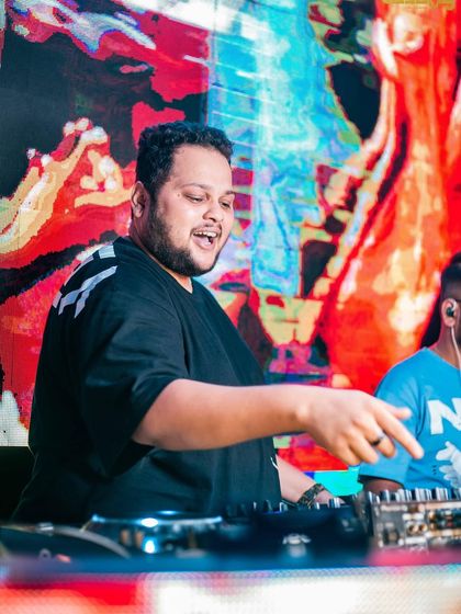 I'm all about peace, unity, and love. A happy, interactive shot of me pointing and smiling at the decks.