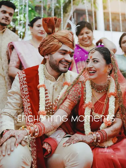 A candid shot of the happy couple, their genuine laughter capturing the essence of their special day.