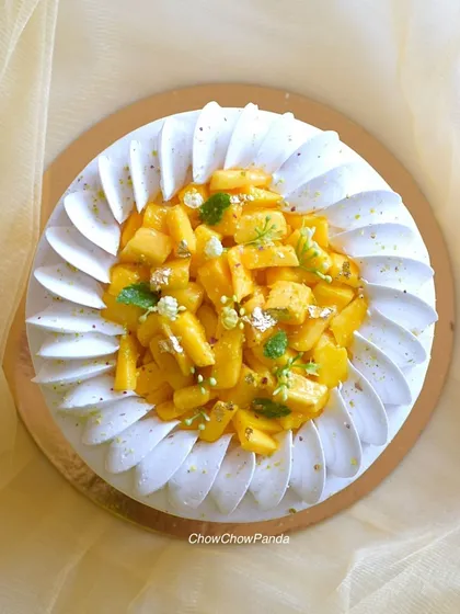 This is my signature Mango Cake, made when the fruit is in season. I top a soft vanilla sponge with fresh, juicy mango chunks and light cream, creating a cake that's all about natural, delicious flavour.