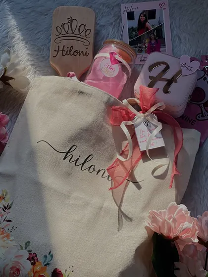 Another look at this gorgeous personalized tote bag hamper for Hiloni. It's a perfect example of how you can combine practical items with beautiful aesthetics for a memorable bridesmaid gift.