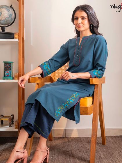 Our Haveli Crewel Blue Straight Fit Kurta, handcrafted with delicate Kashmiri floral embroidery. Made from 100% pure cotton, it’s as comfortable as it is beautiful.