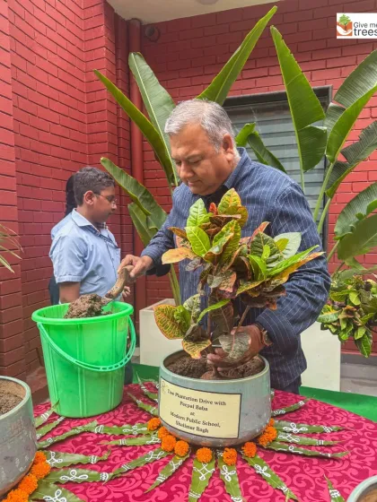 A practical demonstration of potting a plant during my session at Modern Public School. Hands-on activities like this make the lessons on plant care more memorable.