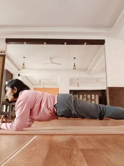 Holding Phalakasana, or the plank pose, is a powerful way to build core strength. Nurturing your body with practices like this is the first step to nurturing your mind and achieving balance.