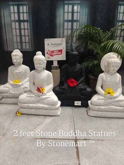 We offer a variety of 2-foot stone Buddha statues, as seen in this collection. It features different styles in both white and black marble, perfect for a balcony or home altar.