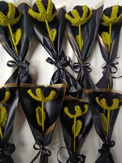 Individually wrapped black open tulips, a custom design for a client.