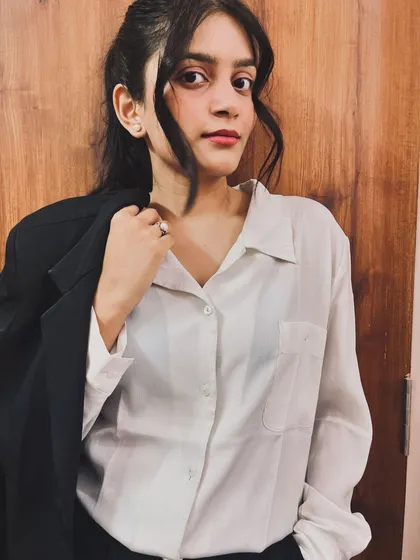 Born to argue, and dressed for it. This look, with my jacket over my shoulder, reflects a readiness to engage and a dynamic approach to legal strategy.
