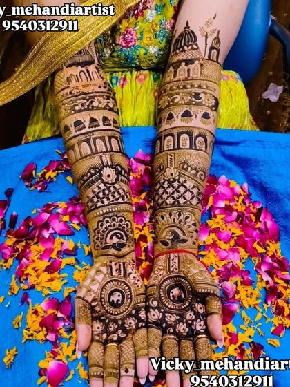 A unique design featuring Yin and Yang symbols on the palms, surrounded by traditional Indian architectural motifs on the arms.