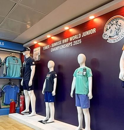 The official merchandise and apparel sales booth at the BWF World Junior Championships. We design and construct these retail structures as part of our venue transformation services.