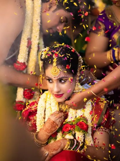 A duplicate of 99, a close up of the sacred Mangalsutra tying ceremony.
