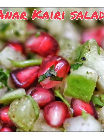 A refreshing Anar Kairi Salad, combining pomegranate with raw mango for a tangy and sweet taste.