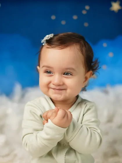 An absolutely precious smile from the baby girl during her starry night themed shoot. Capturing these moments of pure joy is what I love most.