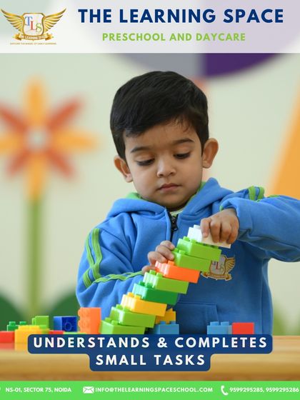 A child builds a tall tower with colorful blocks. This classic activity is fundamental for developing problem-solving skills, patience, and an understanding of balance and structure.