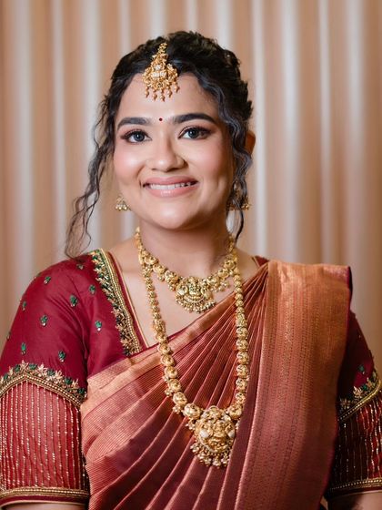 A happy and radiant portrait of Sowmya. The makeup is kept fresh and minimal to let her natural beauty shine.