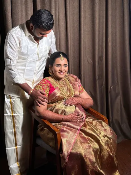A lovely photo of the happy couple at their baby shower. Raji's makeup is designed to look fresh and beautiful throughout the event.