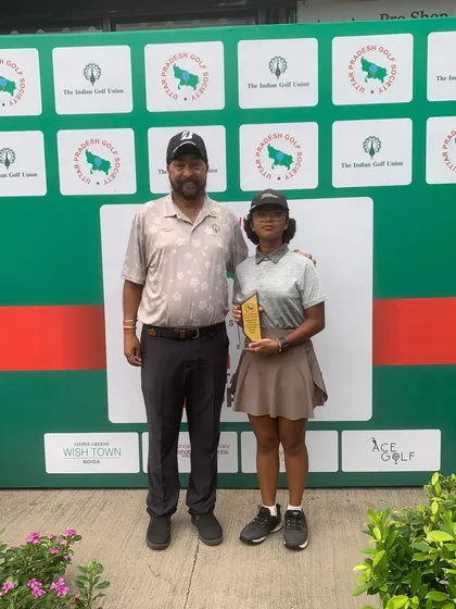 Dalisha Chetry with her winner's plaque for Category B Girls at the 4th Uttar Pradesh Open.