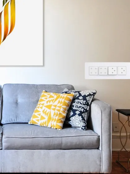 Our white WiFi smart switches blend perfectly with any modern living room decor. They provide feather-touch control and connect your home to our smart ecosystem, fitting into your existing switchboards without any alteration.