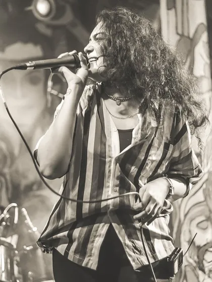 Our female vocalist, Dhruvi Singh, in her element. Her dynamic stage presence and versatile singing style command the audience's attention from the first note to the last.