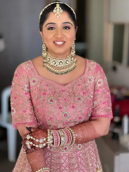 A happy and confident bride. The makeup is subtle enough to let her natural beauty shine through, just enhanced.