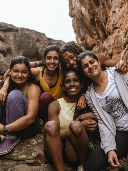 A group of our core team members sharing a hug. This is the heart of CLAW: women supporting women, on and off the rock.