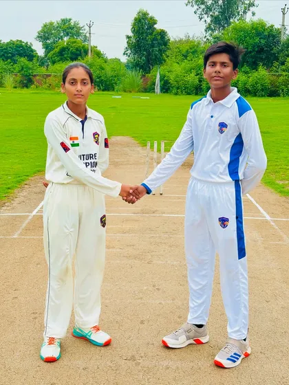It's match day. Two skilled captains, a boy and a girl, ready for the toss. One goal: victory.