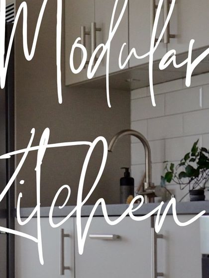 An inspirational image showcasing a modern kitchen aesthetic with clean lines, a subway tile backsplash, and simple decor.