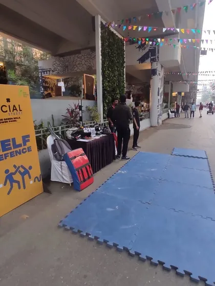 Our setup at the Social Street event, with mats ready for demonstrations and practice. We bring the training to you.