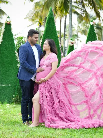 A dramatic butterfly pose with a pink ruffled gown. The "wings" of the dress create a stunning visual effect in our outdoor setting.