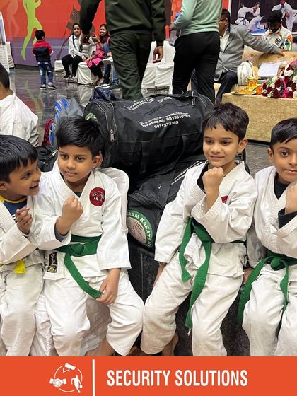 Young participants of the Royal Challengers Karate Cup pose for a photo. Our venue is a safe and encouraging space for martial artists of all ages to compete.