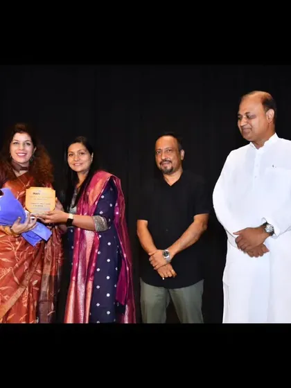 A full view of the moment we honor Mrs. Nishitha Tripathi. Recognizing our guests is a way of thanking them for contributing to the success and morale of our event.