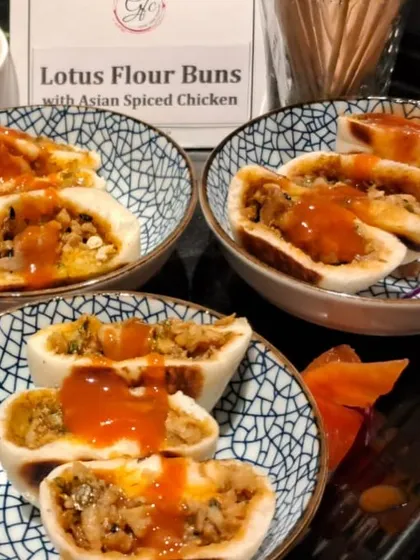 Bun-believable delights! Our soft Lotus Flour Buns are stuffed with Asian-spiced chicken and drizzled with a savory sauce for a truly satisfying bite.