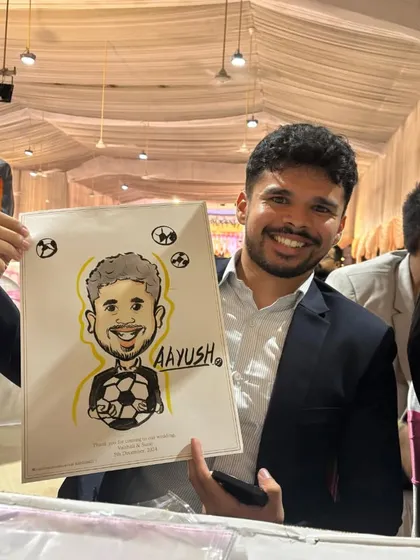 This guest's love for football was incorporated into his caricature. I can add hobbies or props to make your portrait even more personal.