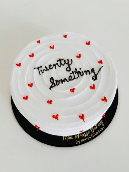 An overhead shot of the popular 'twenty something' cake. The clean lines and minimalist design make it perfect for a modern celebration.