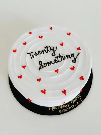 An overhead shot of the popular 'twenty something' cake. The clean lines and minimalist design make it perfect for a modern celebration.
