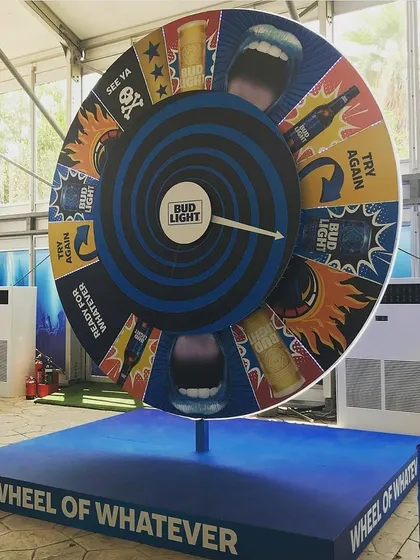 We go beyond digital with large-scale physical activations like this giant "Wheel of Whatever" for Bud Light. This custom-built, fully branded prize wheel adds a classic, tactile element of chance and excitement to product launches and promotional events.