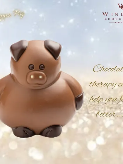 Chocolate therapy can help you feel better. This "Peppa Pig" inspired chocolate figurine is a fun and recognizable character, perfect for children's parties or fans of the show.