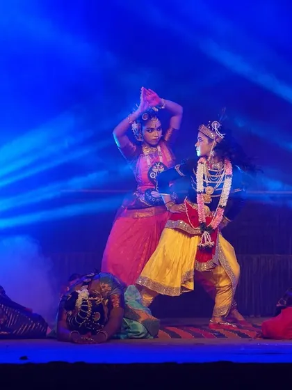 A dynamic scene from our "KRISHNA" production at the Udupi Sri Krishna Matha. The combination of blue stage lights and fog creates a mystical setting for the dance.