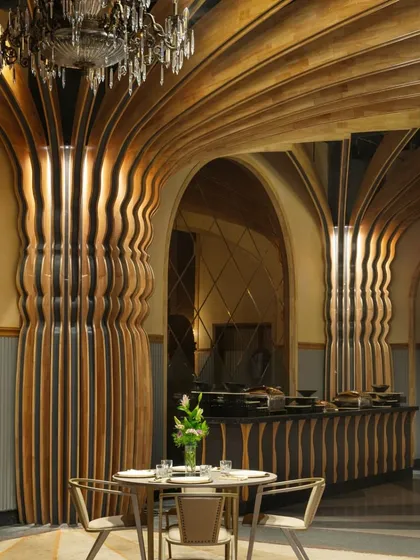 At Nishtara Banquet Hall, we crafted an environment of grandeur and warmth. The intricately detailed rubberwood columns and vaulted ceilings are inspired by Kolkata's rich architectural heritage, creating a memorable setting for significant life moments.